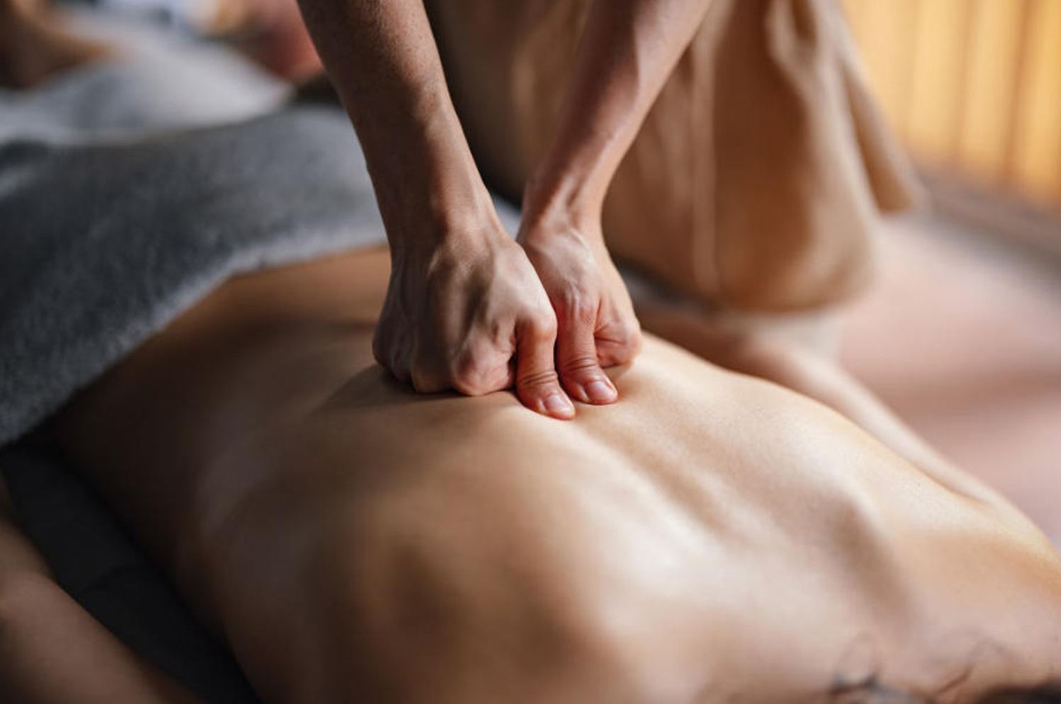 Massage session focused on lower back at Blue Bay SPA in Winter Park FL — lower back pain relief